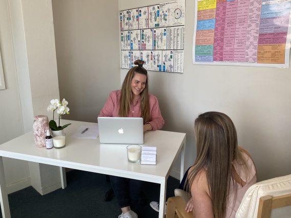 Janette in a Kinesiology session with a client